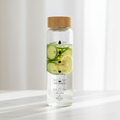 1000ml borosilicate glass water bottle lifestyle shot on marble surface